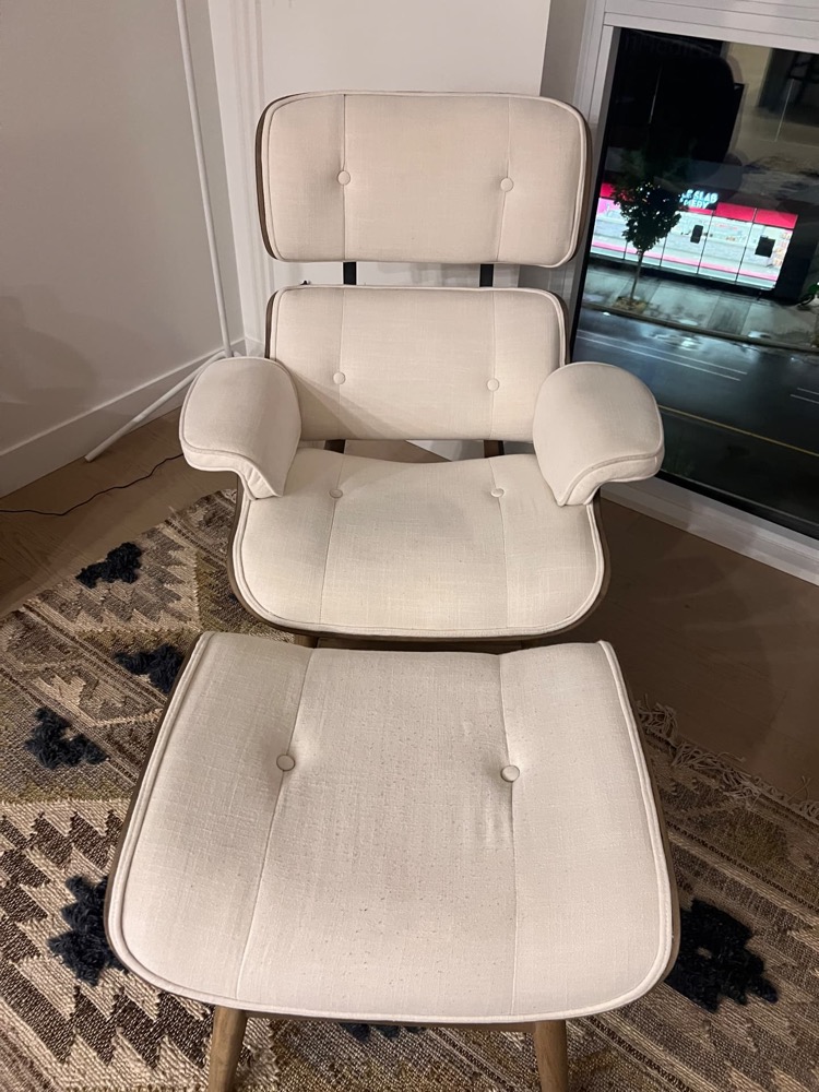 Cream fabric lounge chair and ottoman after professional upholstery cleaning